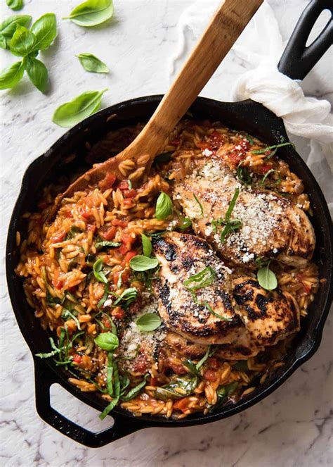 Chicken pasta in a garlic tomato cream sauce is the ultimate comfort meal. One Pot Italian Chicken & Orzo / Risoni Pasta | RecipeTin Eats