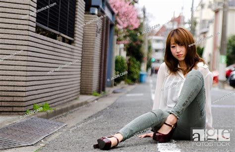 Japanese Girl Poses On The Street In Jiyugaoka Japan Jiyugaoka Is A