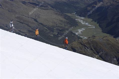 Mountain Climbers On Snowy Slope — Stock Photo © Londondeposit 33836323