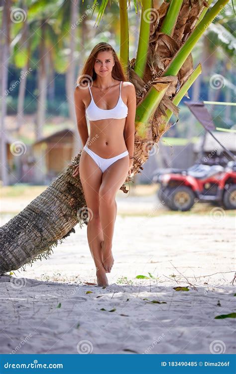 Beautiful Girl In White Bikini Posing At The Tropical Beach Stock Image Image Of Enjoyment