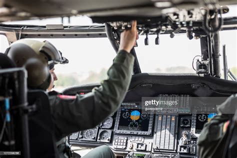 Army Pilot Riding Military Helicopter High Res Stock Photo Getty Images