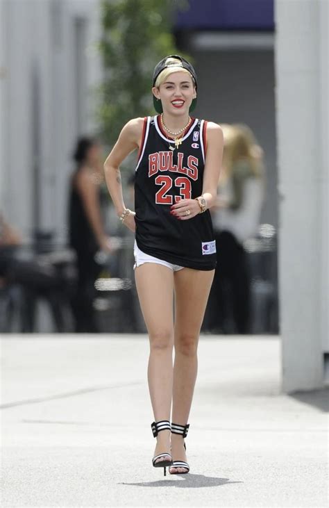 Miley Cyrus In A Basketball Shirt And No Pants Outside CenterStaging