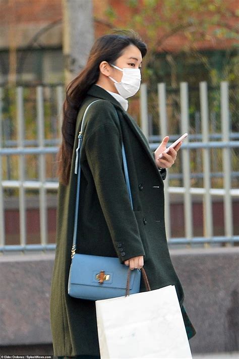 princess mako is spotted carrying christmas ts while stopping by nyc apartment building