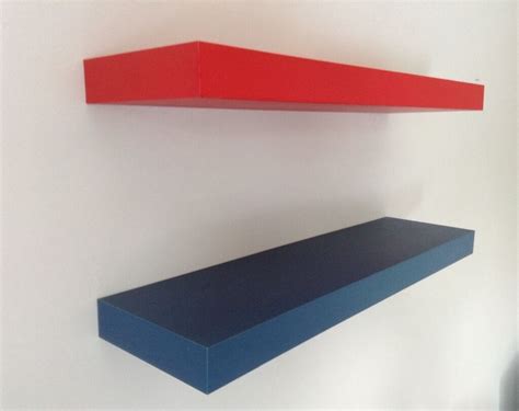 Look really nice when on the wall, can be used for books etc bargain £3. Set of 2 FLOATING SHELVES from NEXT, Red and Blue in VGC ...