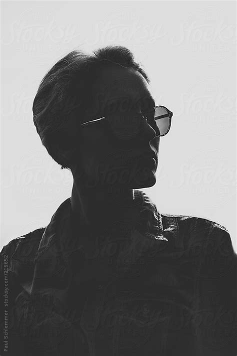 Black And White Photograph Of A Woman Wearing Glasses By Pixela For Stockstuffs