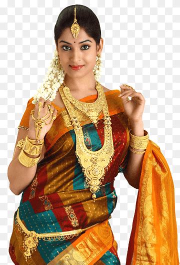 Free Download Woman Wearing Gold Colored Accessories And Orange Sari