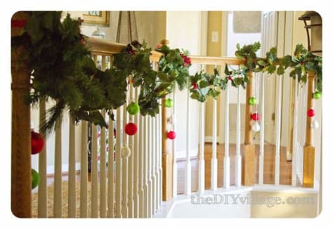 Measure your banister before you buy the garlands and ribbon. Christmas Banister Garland - the DIY village