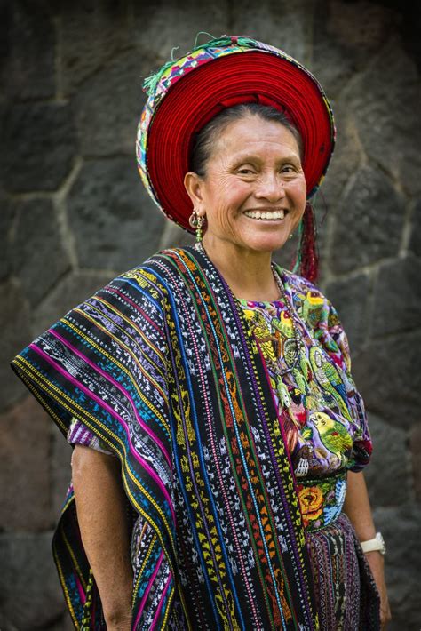 A Maya Woman Wears Traditional Dress Including Tocoyal Headdress