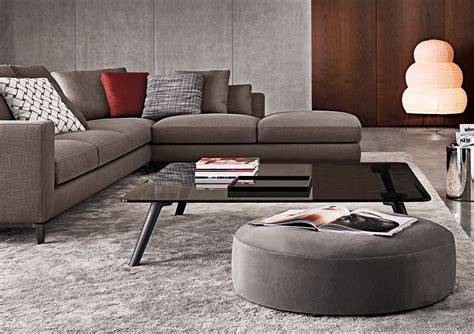 The coffee table measures 120×95 cm and is composed of an elliptical base and a raised circular top equipped with a mechanism that allows it to turn 360 degrees and makes the table top extendable towards the sofa. Minotti Ipad - SULLIVAN | TAVOLINI - IT | Coffee table ...