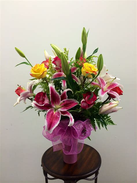 Today's beautiful pink lily and Rose arrangement. Browse more designs