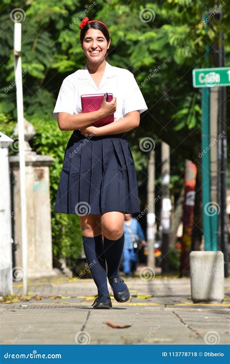 Teen School Girl Wearing Uniform Walking To School Stock Photo Image