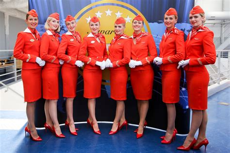 Photos Of Flight Attendant Uniforms Then And Now