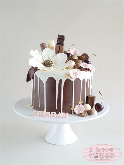 Drippy Chocolate Cake With Beautiful Flowers Decorating The Top