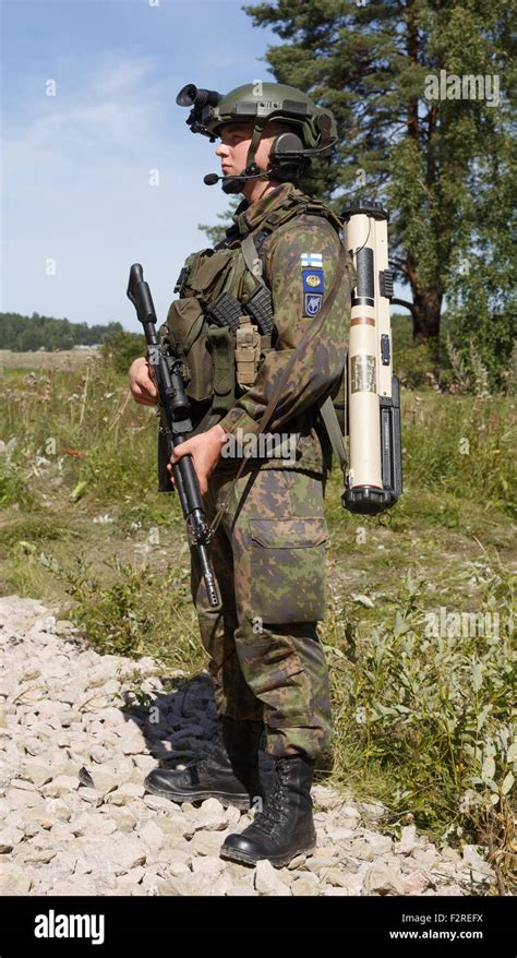 Finnish Soldier With Modern Weapons And Fighting Equipment Including