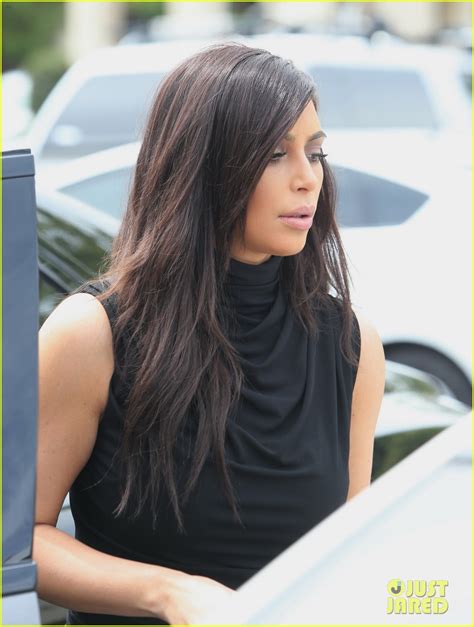 Kim Kardashian Shows Off Her Curves In Form Fitting Dress Photo