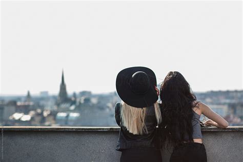 Two Female Friends On Top Of The Building By Stocksy Contributor Jovana Rikalo Stocksy