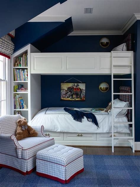 Navy Blue Boys Bedroom Features Built In Bunk Beds Lined With Red And