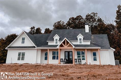 New American Farmhouse Plan With Brick And Board And Batten Exterior