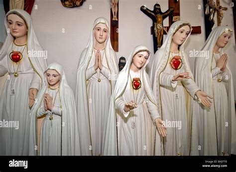 Virgin Mary Statues Stock Photo Alamy