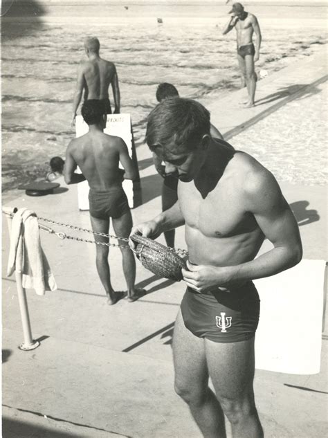 vintage black and white photograph of swimmers by male photography elysium books