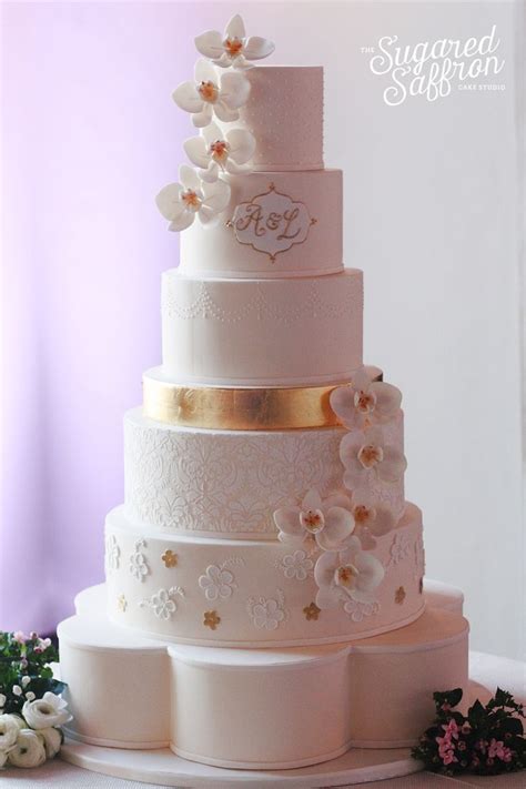 Ivory Cake With Gold Leaf Detail And Sugar Orchids London Wedding
