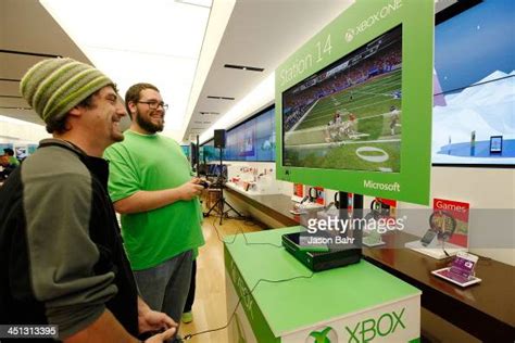 Gamers Attend The Microsoft Retail Store Xbox One Midnight Launch