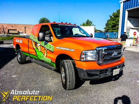 How much does a wrap cost? College Hunks Hauling Junk Pickup Truck Wrap - Baltimore