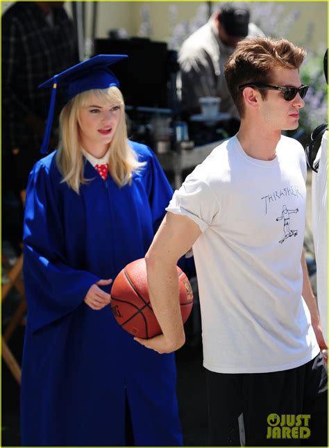 Emma Stone And Andrew Garfield Kiss At Spider Man Graduation Photo