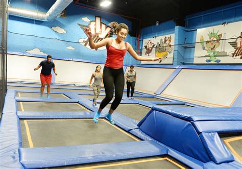 an indoor trampoline park offers flips and fitness in new york city the new york times