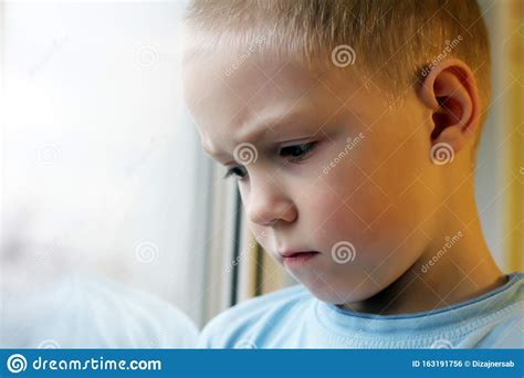 Sad Boy At The Window Loneliness And Depression Stock Photo Image Of