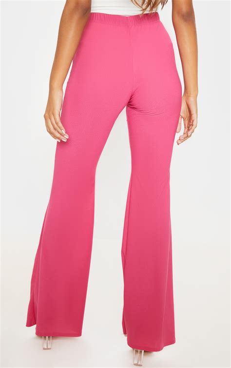 Hot Pink Knot Front Flared Trousers Prettylittlething Ca