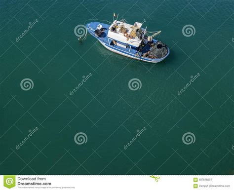 Aerial View Of A Fishing Boat Moored Nature And Marine Landscape