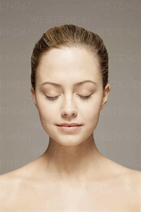 Close Up Of Woman With Eyes Closed Stock Photo