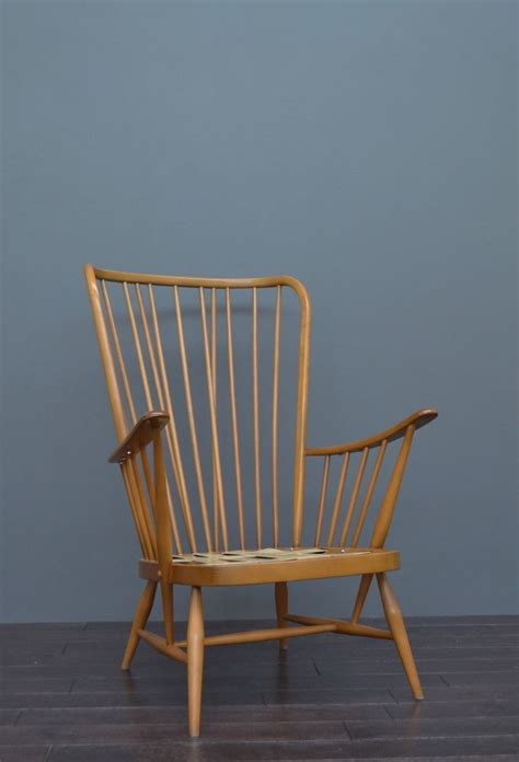 The graceful steam bent curves of vintage ercol chairs lend them a truly timeless quality. Vintage Retro Mid Century Ercol Tall Lounge Armchair Chair ...