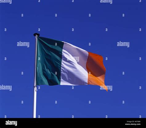 Irish Flag With Blue Sky Ireland Stock Photo Alamy