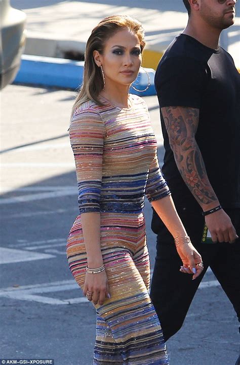 Jennifer Lopez Looks Groovy In A Multi Colored Stripy Jumpsuit On