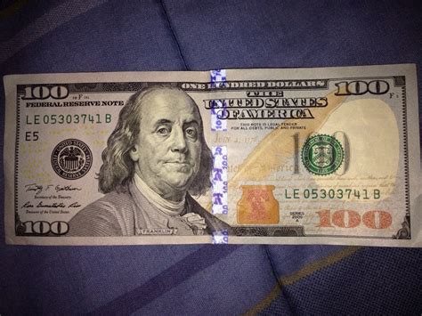 The New Us 100 Bill Has Hidden Liberty Bells In The Blue Holographic