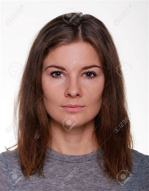 Female Head Shot With Neutral Face Expression And White Background