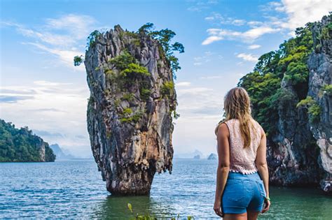 Girl In Front Of Iconic Island In Phang Nga Bay Thailand Stock Photo