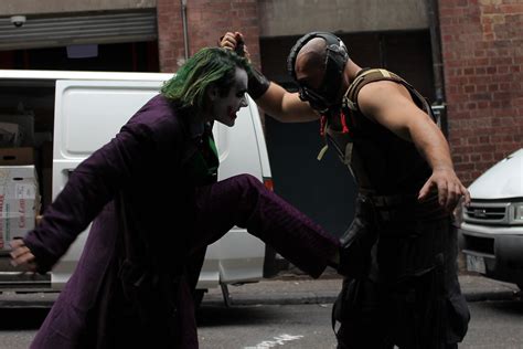 Joker Vs Bane A Shot Of The Joker And Bane Fighting