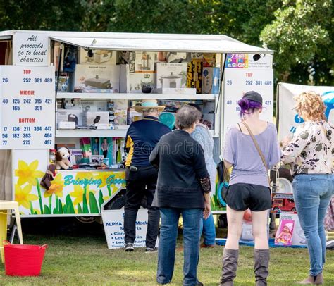 Charity Ticket Stall At Outdoor Food And Wine Festival Editorial Stock