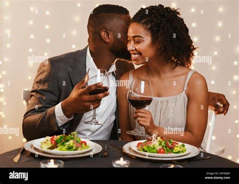 Romantic Black Couple Having Dinner At Restaurant Stock Photo Alamy
