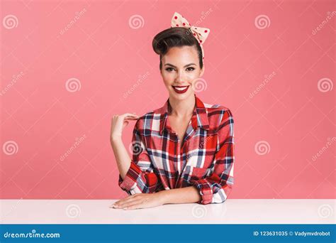 Portrait Of A Cheerful Brunette Pin Up Girl In Plaid Shirt Stock Image