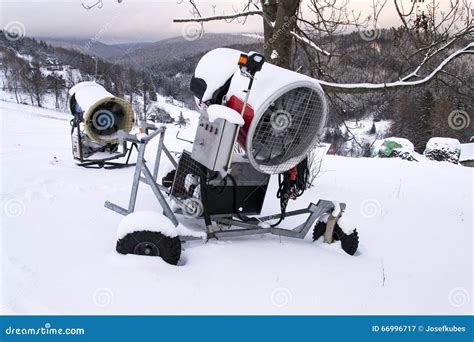 Snow Making Machine On Piste At Ski Resort In Snowy Country Stock Image