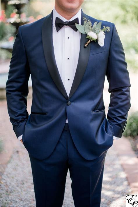Navy Blue Tux With Coral Boutonniere Designed By Engaging Events