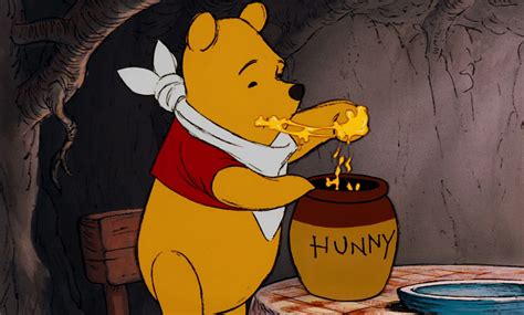 Winnie The Pooh Is Eating Honey Winnie The Pooh Cartoon Cute