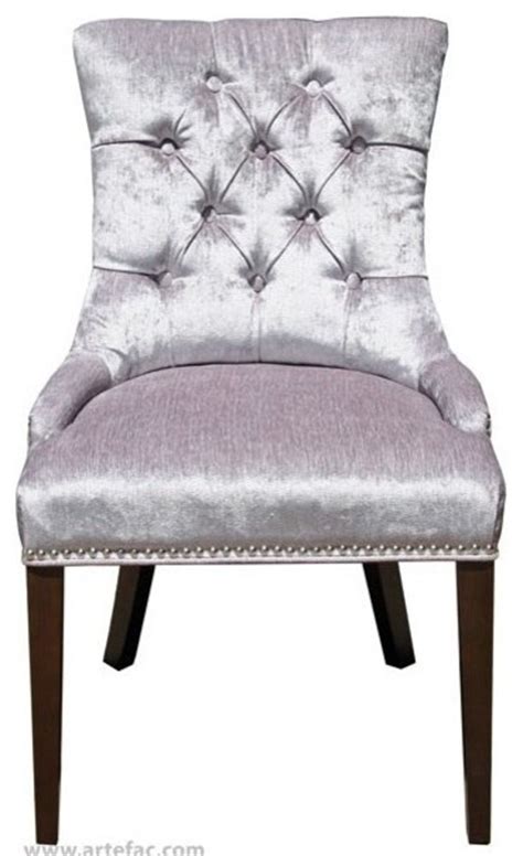 Nail head trim and a slightly extended seatback give this item serious fashion kudos. Accent Tufted Fabric Dining Chair With Silver Nailheads ...