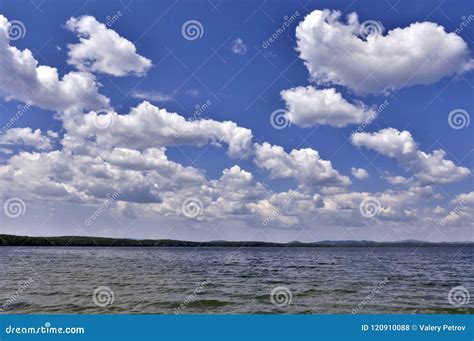 View Of The Blue Sky Over The Lake With Clouds Stock Photo Image Of