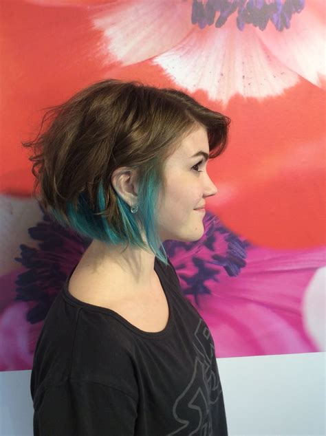 The eyes are of light shades: Pop of blue and turquoise lowlights in brown short hair ...