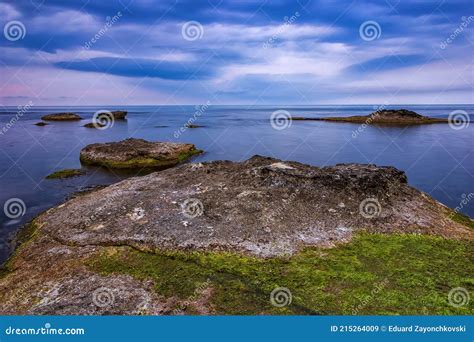 Big Rocks With Moss In A Blue Calm Sea Stock Image Image Of Long